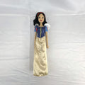 Disney Store Snow White 11.5-inch fashion doll in classic blue and yellow gown with articulated arms