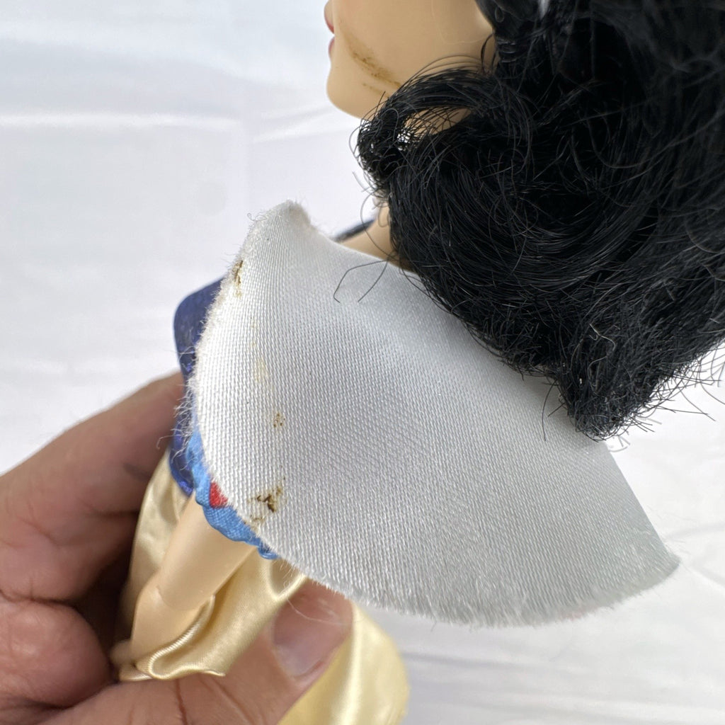 Disney Store Snow White 11.5-inch fashion doll in classic blue and yellow gown with articulated arms