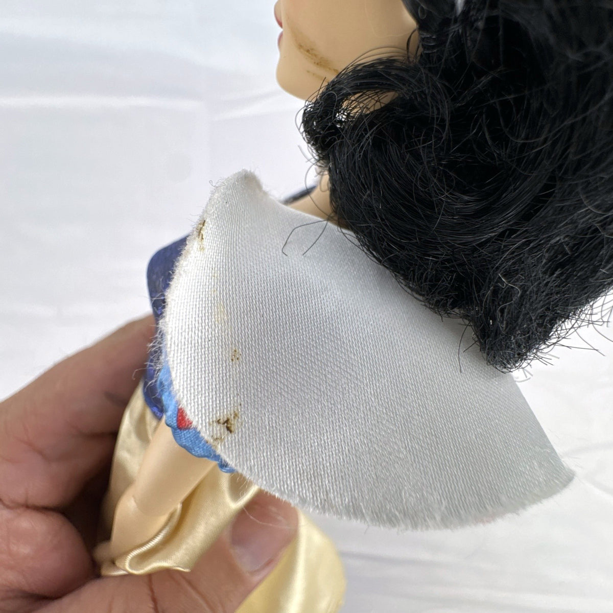 Disney Store Snow White 11.5-inch fashion doll in classic blue and yellow gown with articulated arms