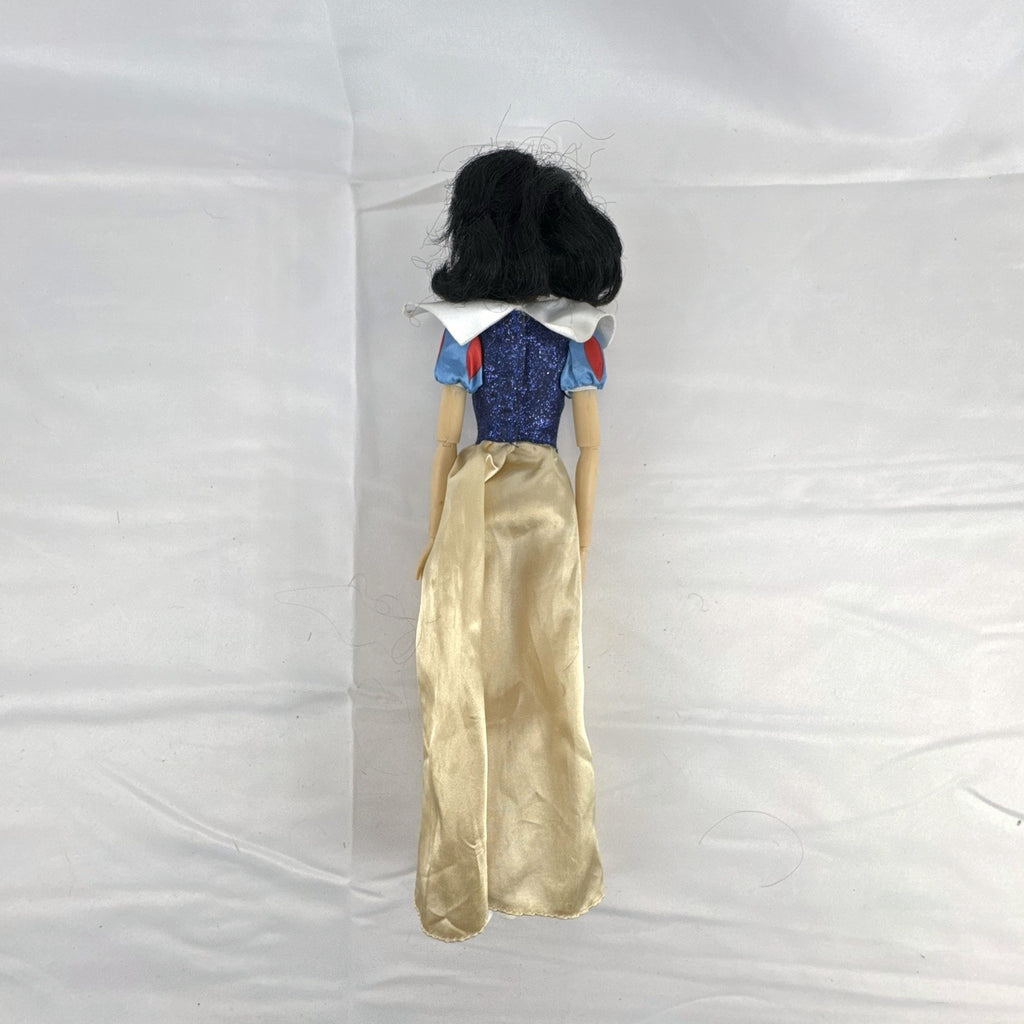 Disney Store Snow White 11.5-inch fashion doll in classic blue and yellow gown with articulated arms