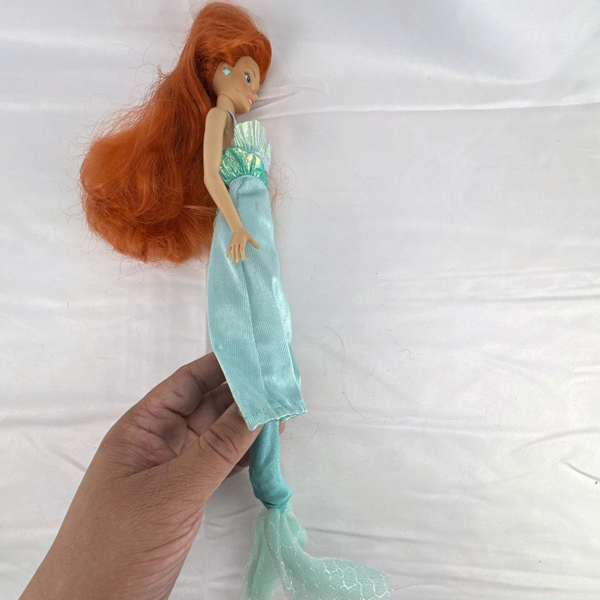 Vintage 1990s Tyco Disney The Little Mermaid Ariel 14-inch doll with red hair and iridescent mermaid tail outfit