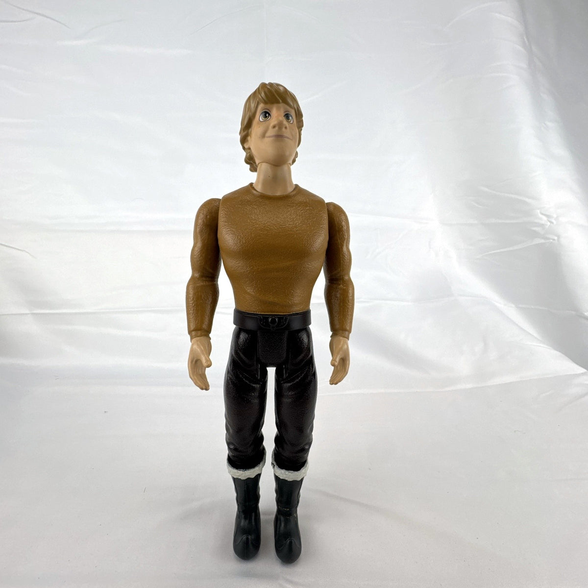 Hasbro Disney Frozen 11-inch Kristoff male fashion doll featuring molded outfit and articulated joints.