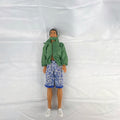Mattel 12-inch Ken doll with molded brown hair wearing green jacket and blue swim board shorts