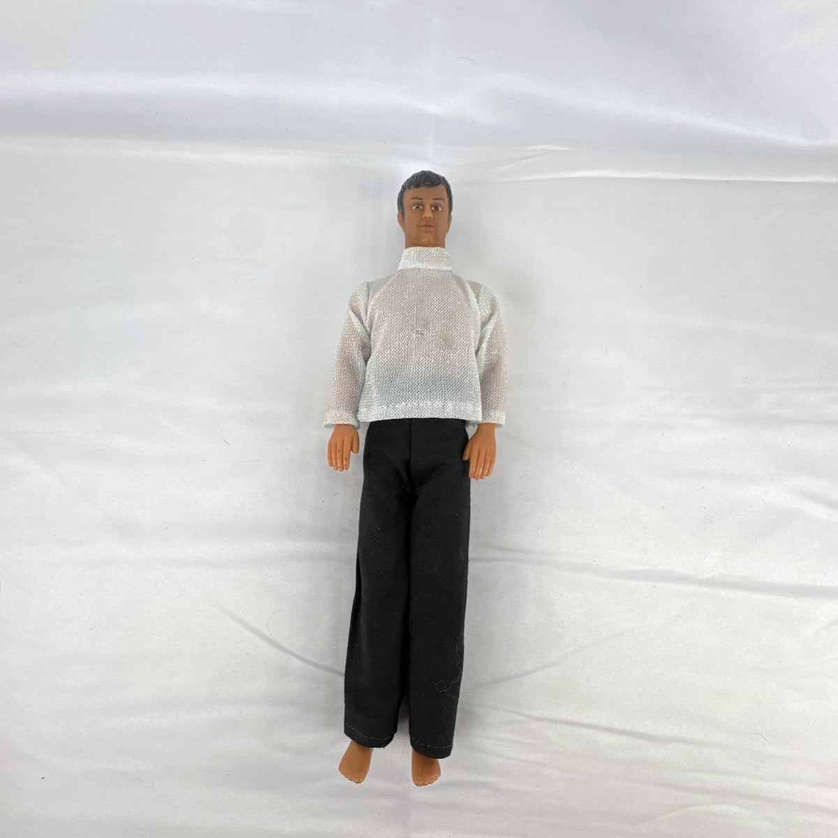 Vintage 1978 Mattel Battlestar Galactica 12-inch Captain Apollo action figure in silver mesh top