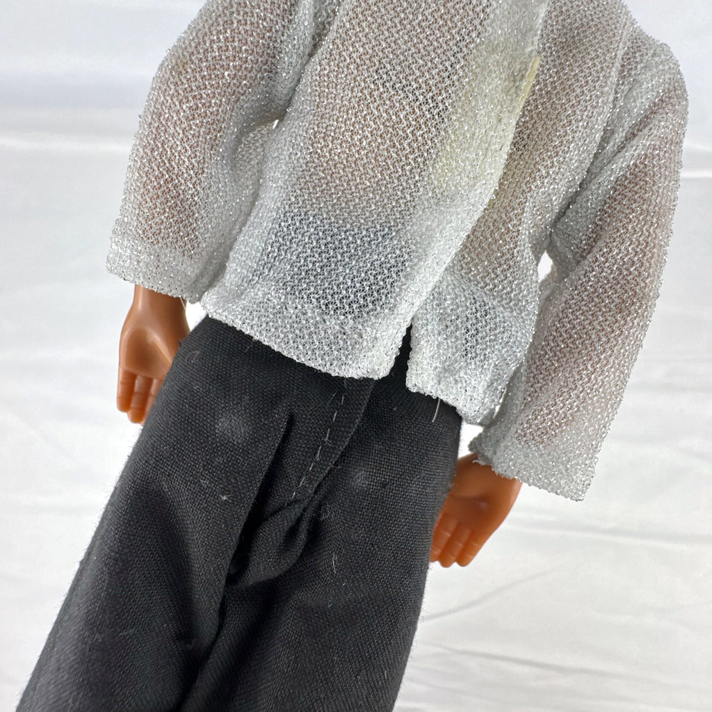 Vintage 1978 Mattel Battlestar Galactica 12-inch Captain Apollo action figure in silver mesh top