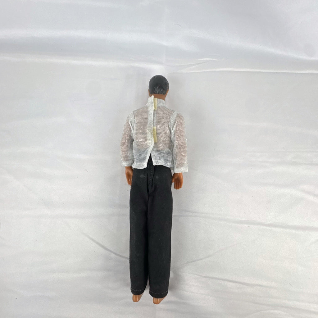 Vintage 1978 Mattel Battlestar Galactica 12-inch Captain Apollo action figure in silver mesh top