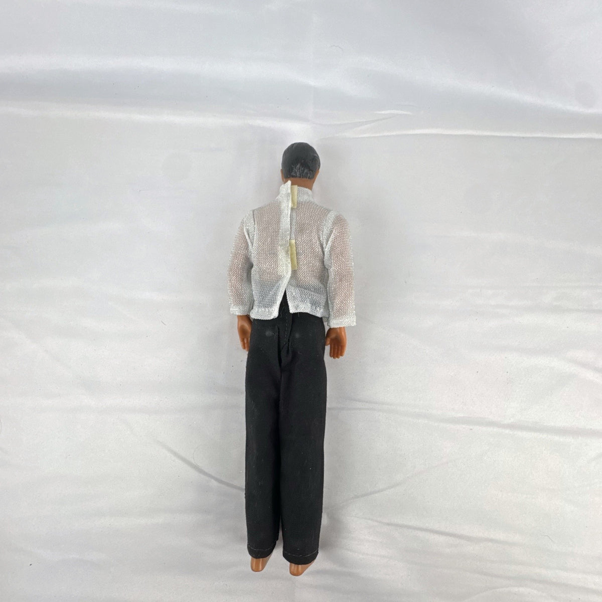 Vintage 1978 Mattel Battlestar Galactica 12-inch Captain Apollo action figure in silver mesh top