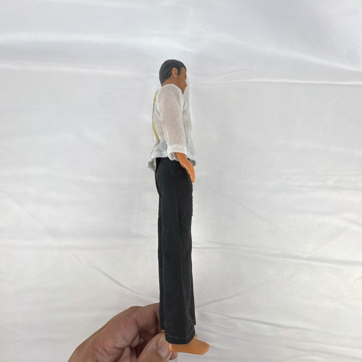 Vintage 1978 Mattel Battlestar Galactica 12-inch Captain Apollo action figure in silver mesh top