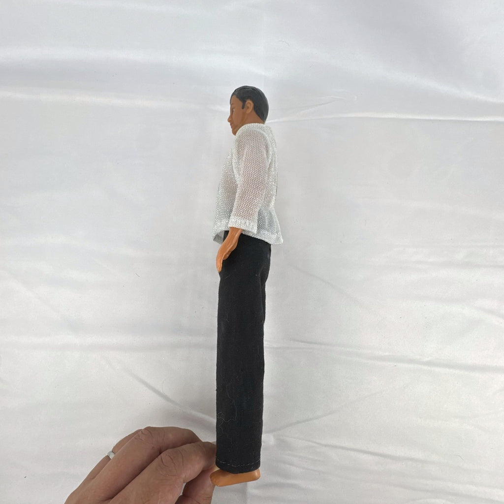 Vintage 1978 Mattel Battlestar Galactica 12-inch Captain Apollo action figure in silver mesh top