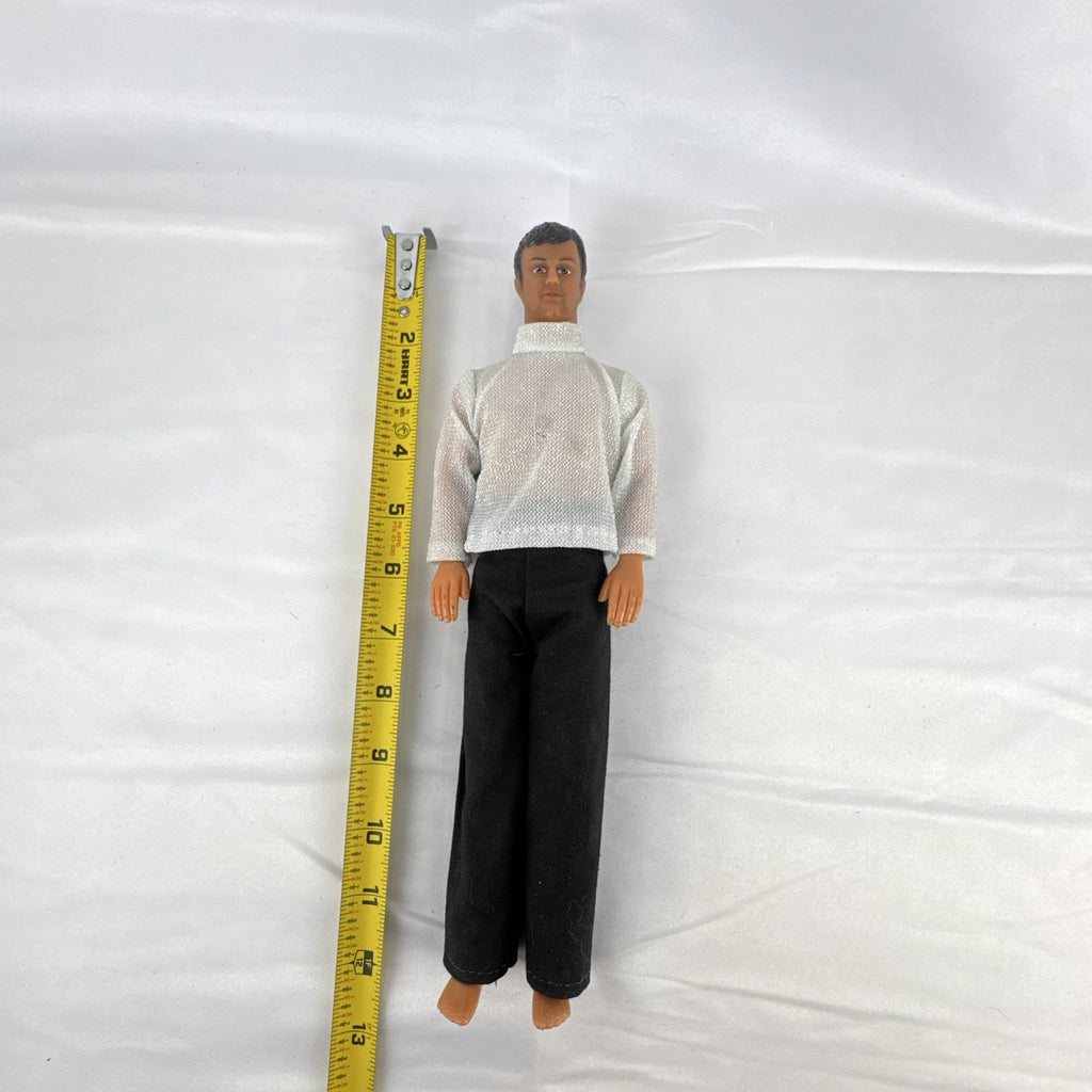 Vintage 1978 Mattel Battlestar Galactica 12-inch Captain Apollo action figure in silver mesh top