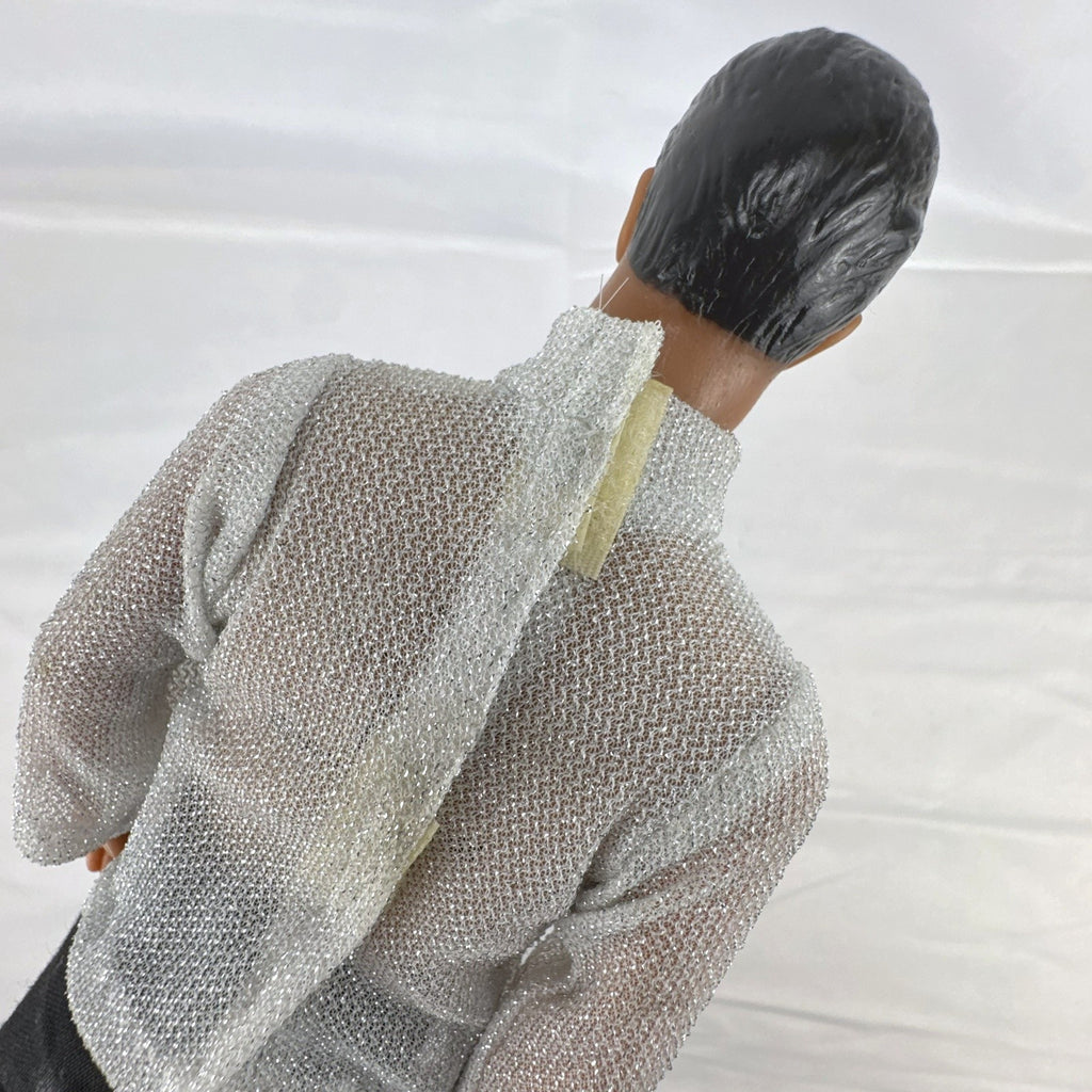 Vintage 1978 Mattel Battlestar Galactica 12-inch Captain Apollo action figure in silver mesh top