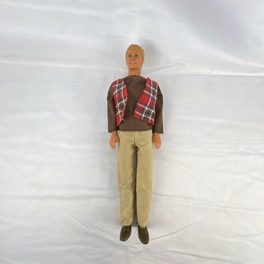 Vintage 1991 Mattel Ken doll with molded blonde hair wearing a red plaid vest outfit and brown shoes