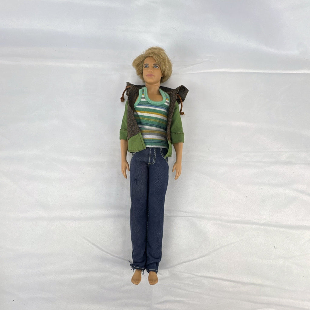 Mattel 2009 Ken 12-inch fashion doll with rooted blonde hair wearing a layered jacket and denim pants