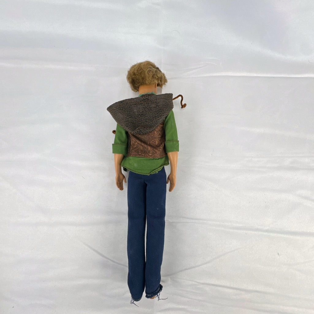 Mattel 2009 Ken 12-inch fashion doll with rooted blonde hair wearing a layered jacket and denim pants