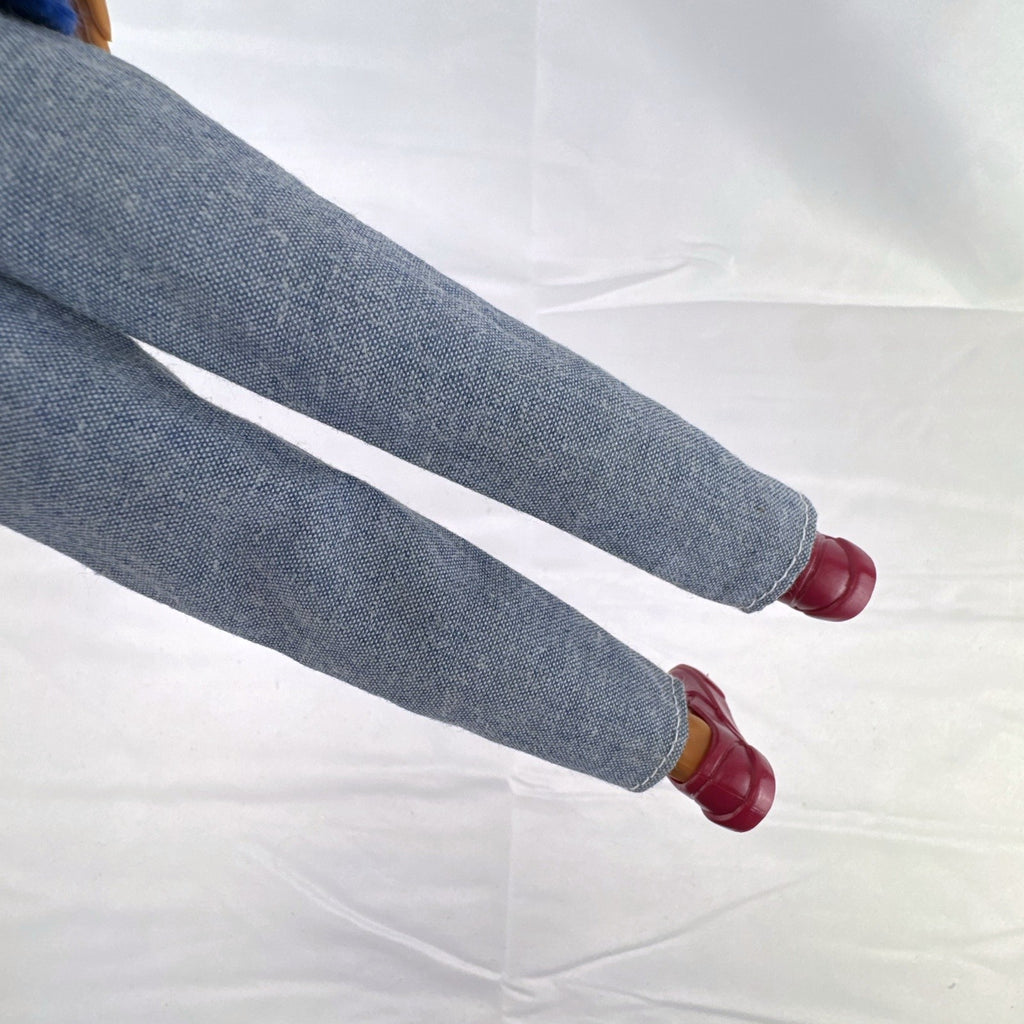 Vintage Mattel Ken doll in blue knit reindeer Christmas sweater, gray pants, and red shoes