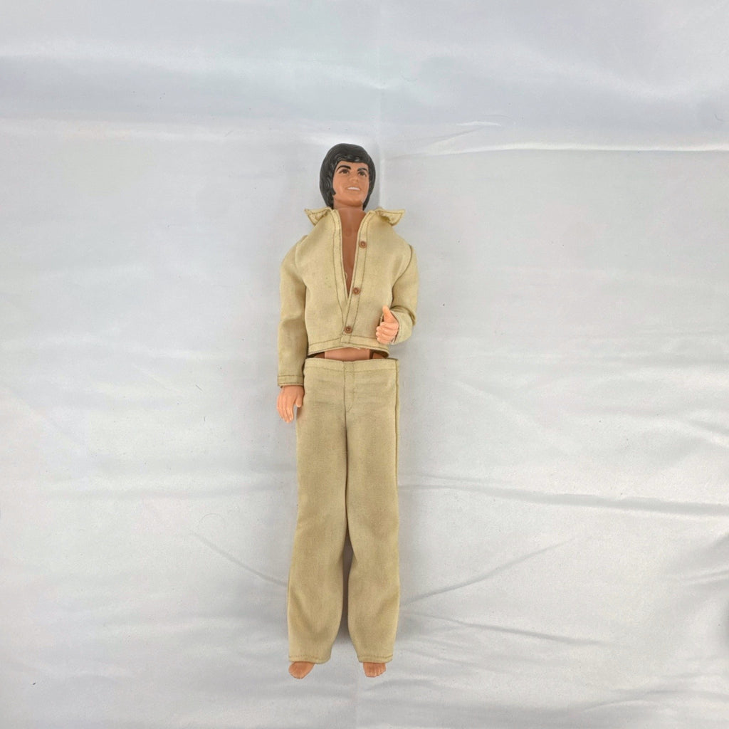 Vintage 1976 Mattel Donny Osmond 12-inch fashion doll wearing two-piece tan leisure suit