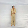 Vintage 1976 Mattel Donny Osmond 12-inch fashion doll wearing two-piece tan leisure suit