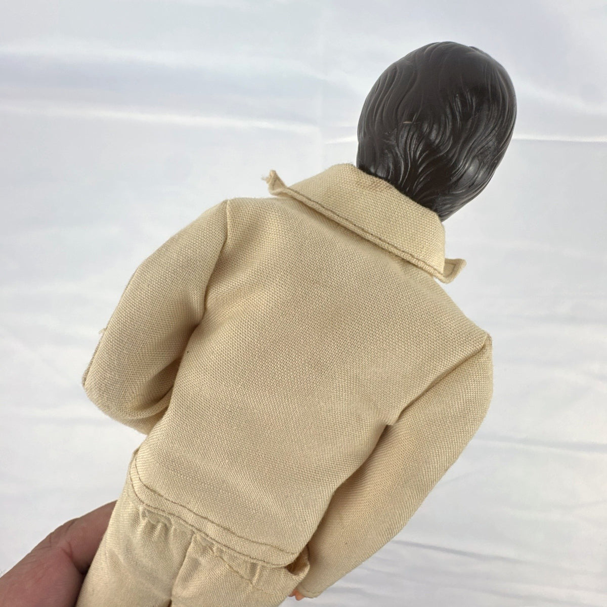 Vintage 1976 Mattel Donny Osmond 12-inch fashion doll wearing two-piece tan leisure suit