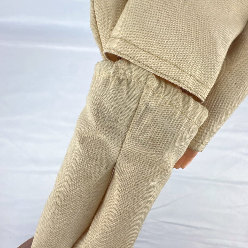 Vintage 1976 Mattel Donny Osmond 12-inch fashion doll wearing two-piece tan leisure suit