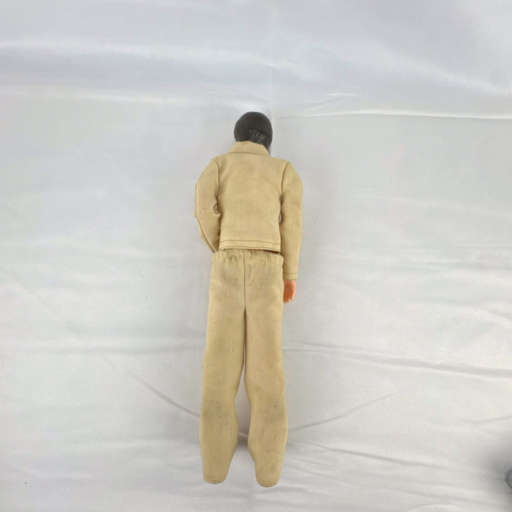 Vintage 1976 Mattel Donny Osmond 12-inch fashion doll wearing two-piece tan leisure suit