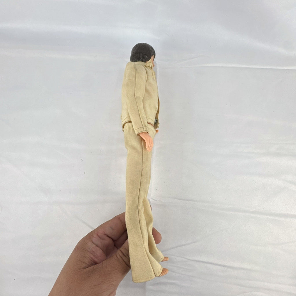 Vintage 1976 Mattel Donny Osmond 12-inch fashion doll wearing two-piece tan leisure suit
