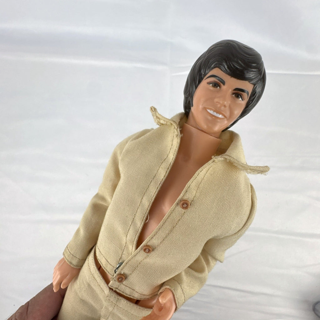 Vintage 1976 Mattel Donny Osmond 12-inch fashion doll wearing two-piece tan leisure suit