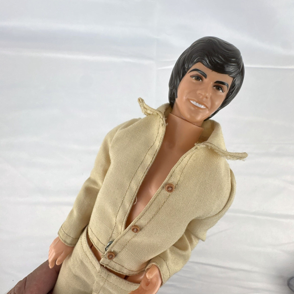 Vintage 1976 Mattel Donny Osmond 12-inch fashion doll wearing two-piece tan leisure suit