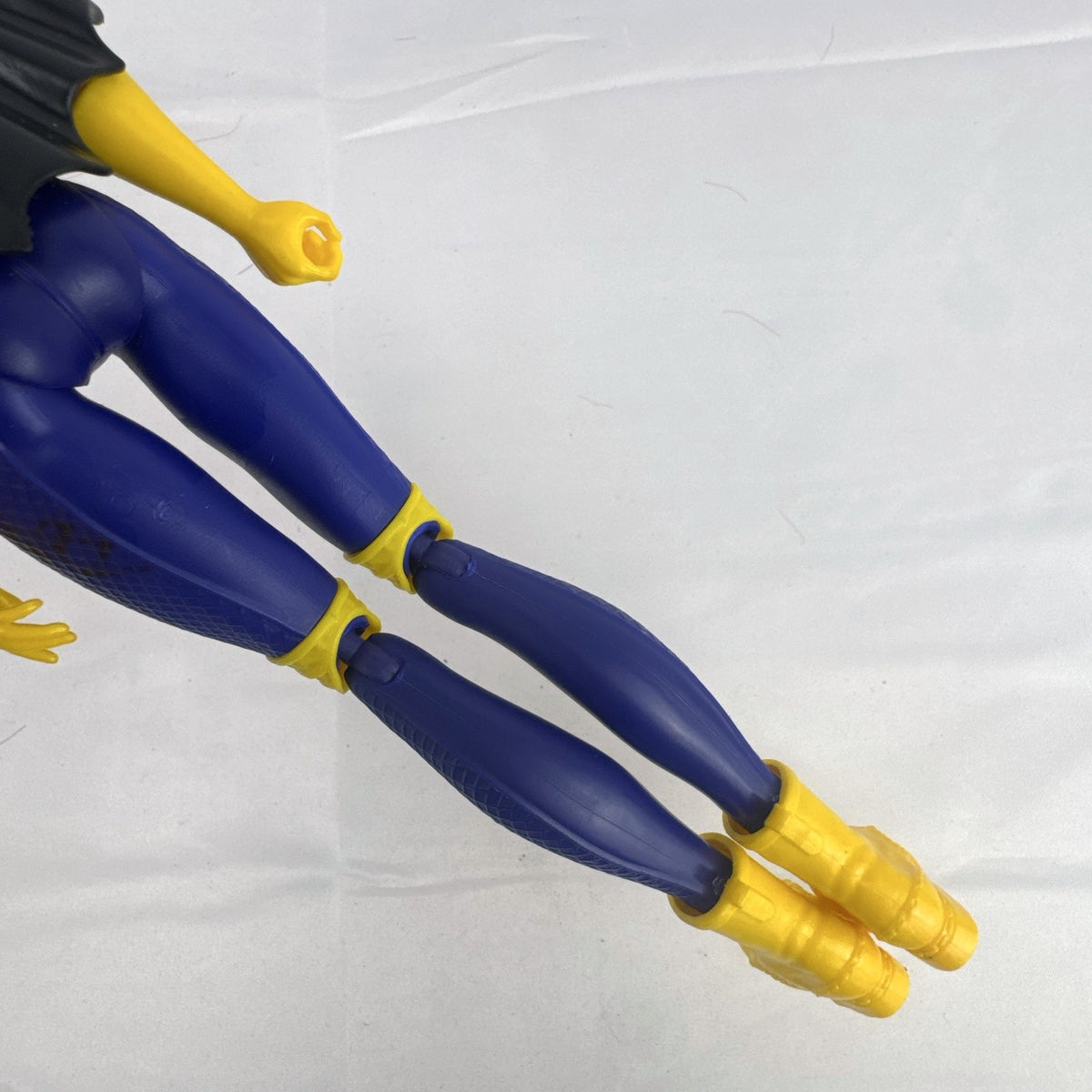 Mattel DC Super Hero Girls Batgirl 12-inch doll with purple suit, yellow boots, and red hair