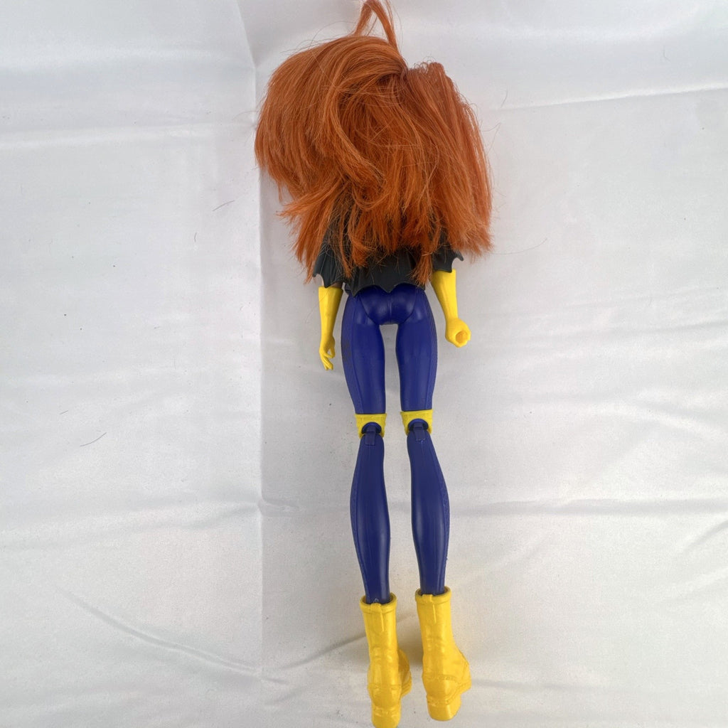 Mattel DC Super Hero Girls Batgirl 12-inch doll with purple suit, yellow boots, and red hair