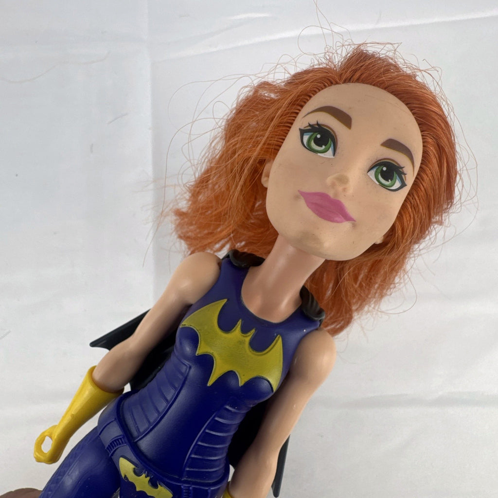 Mattel DC Super Hero Girls Batgirl 12-inch doll with purple suit, yellow boots, and red hair