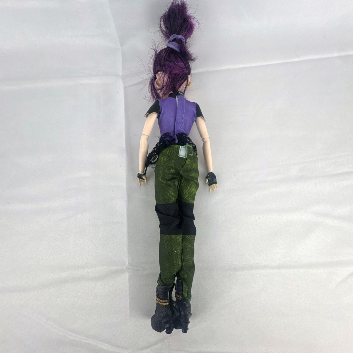 Hasbro Disney Descendants Mal 11-inch articulated fashion doll with purple hair in Isle of the Lost outfit