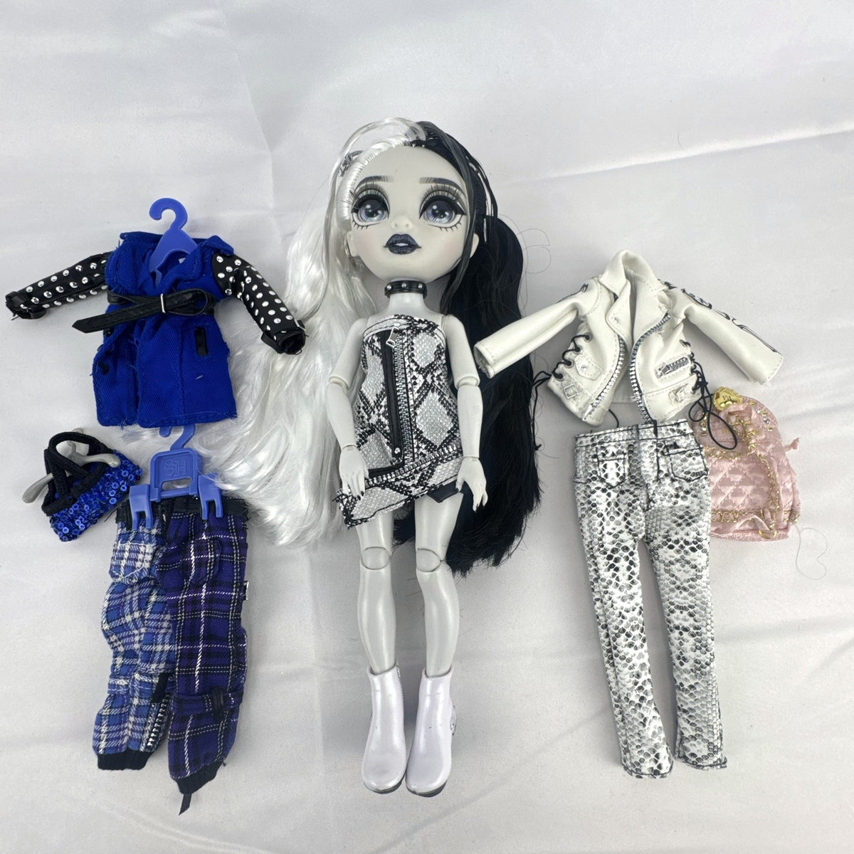 MGA Shadow High Heather Grayson 11-inch fashion doll with split black and white hair and clothing accessories