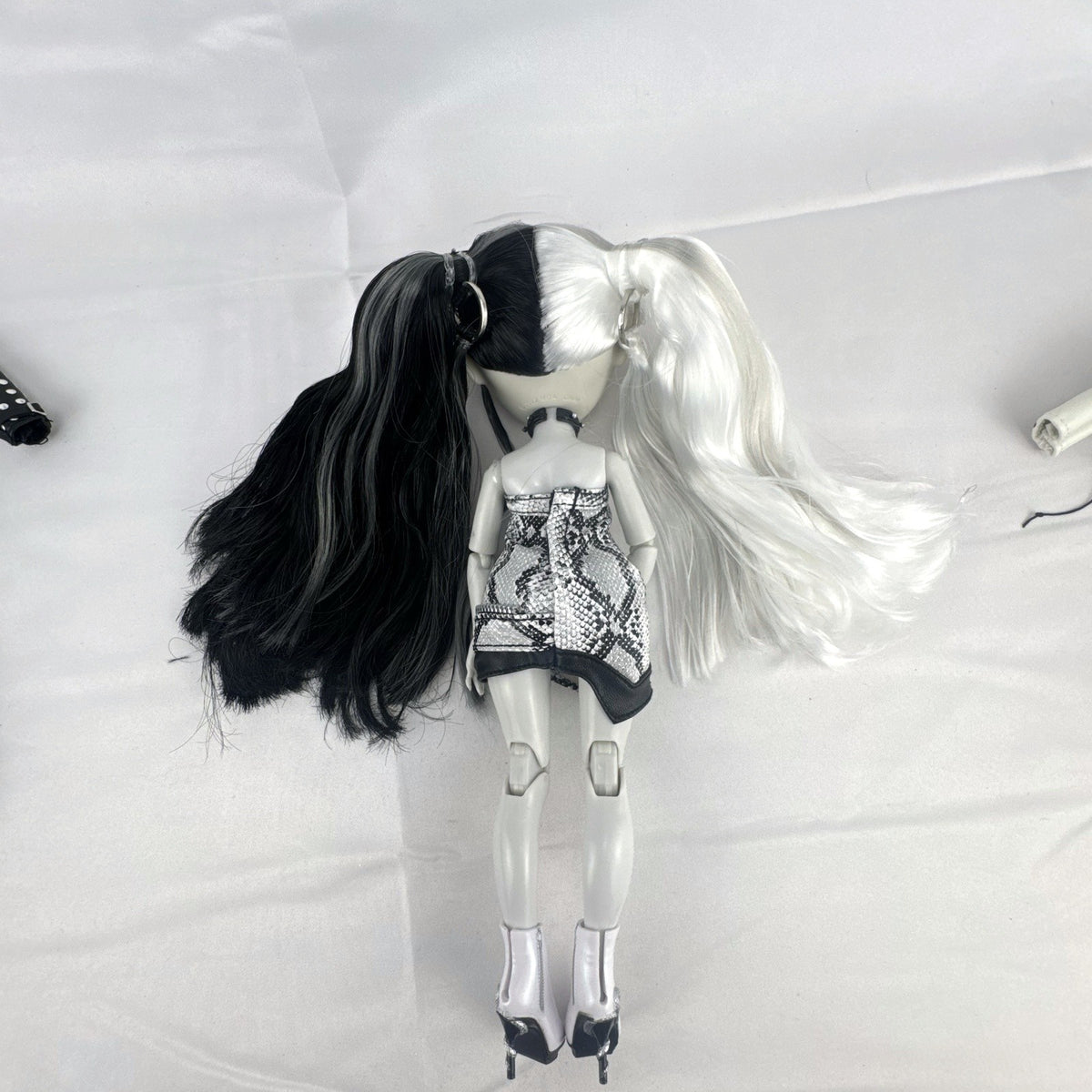 MGA Shadow High Heather Grayson 11-inch fashion doll with split black and white hair and clothing accessories