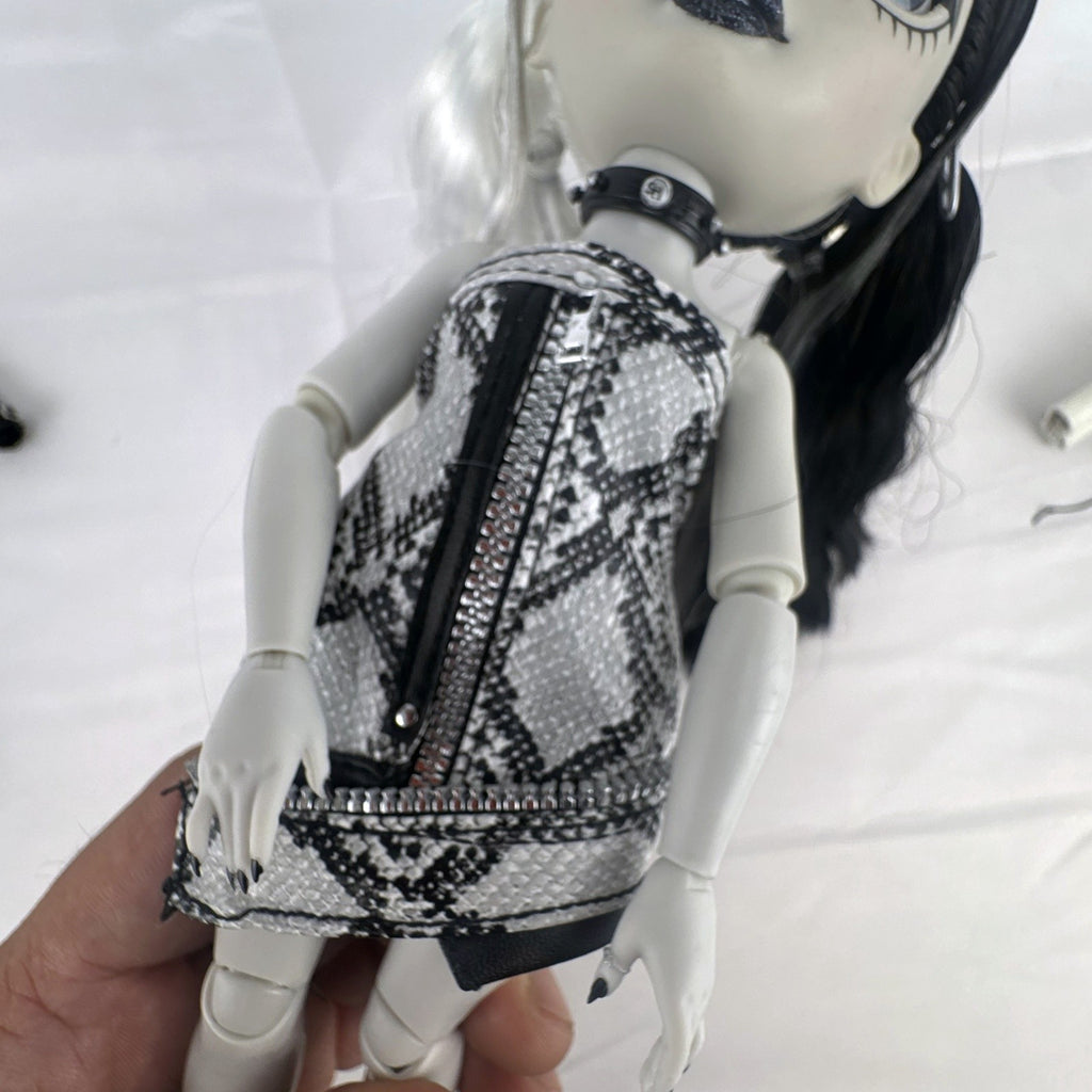 MGA Shadow High Heather Grayson 11-inch fashion doll with split black and white hair and clothing accessories