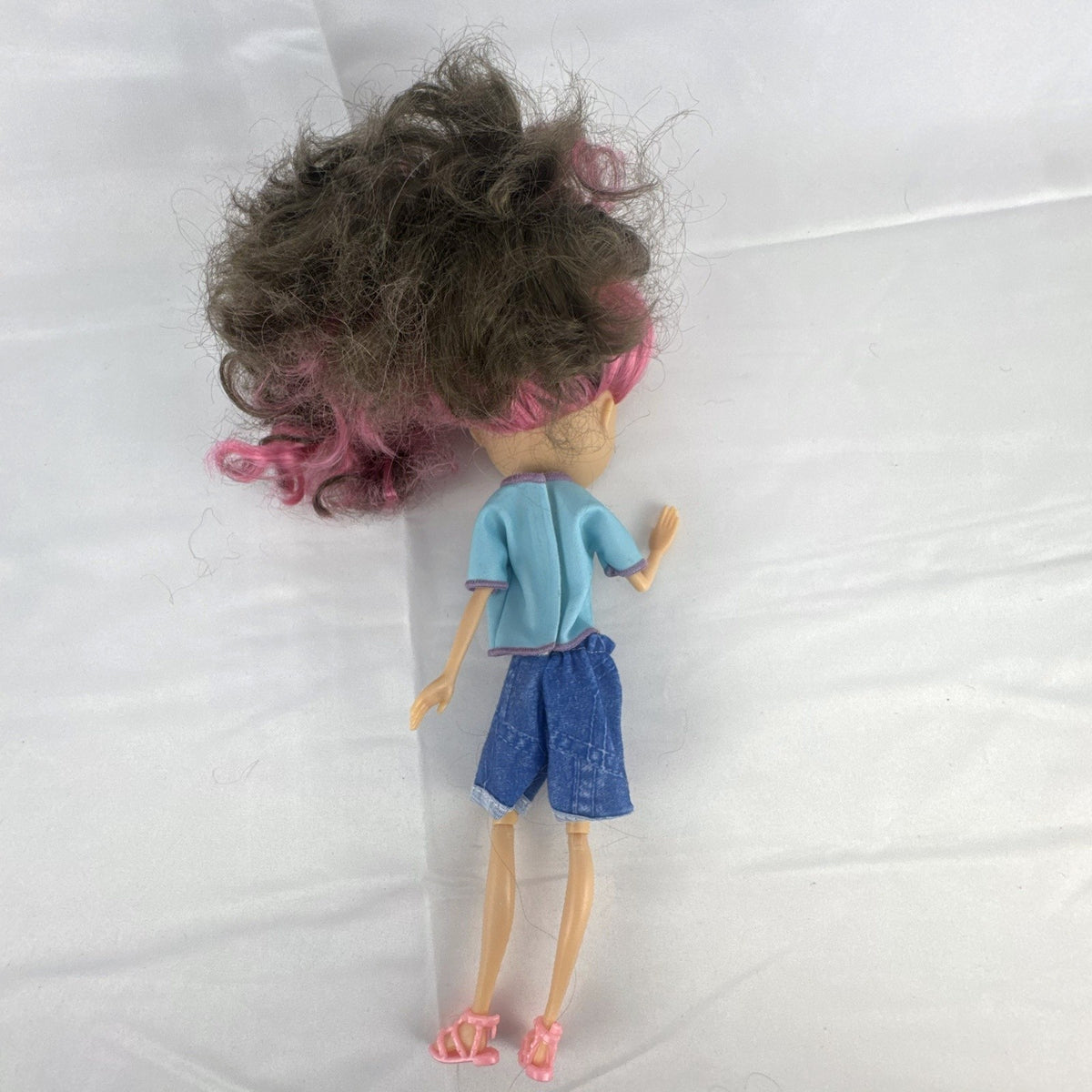 Spin Master La Dee Da Dee 10-inch fashion doll in blue mermaid outfit with brown and pink hair