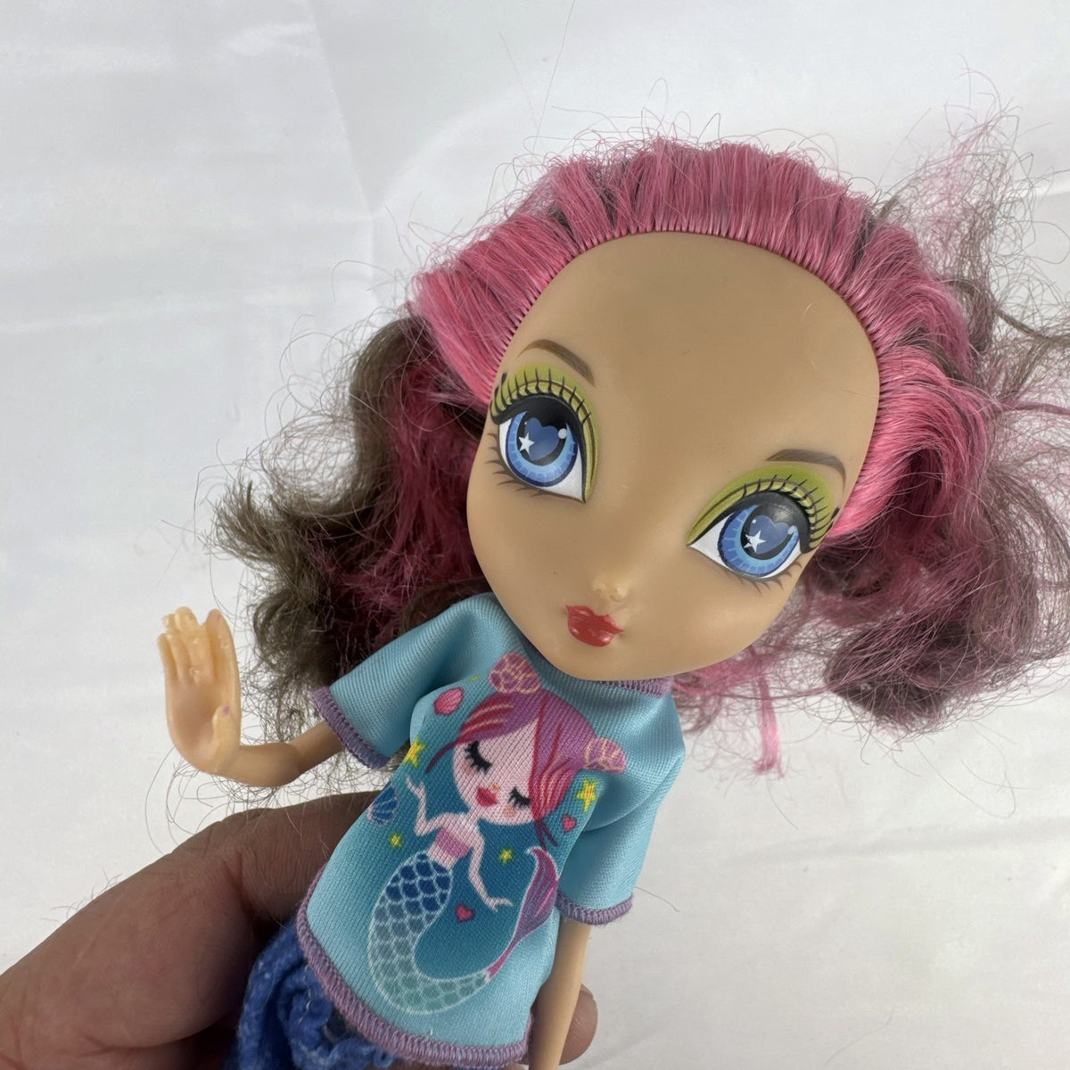 Spin Master La Dee Da Dee 10-inch fashion doll in blue mermaid outfit with brown and pink hair