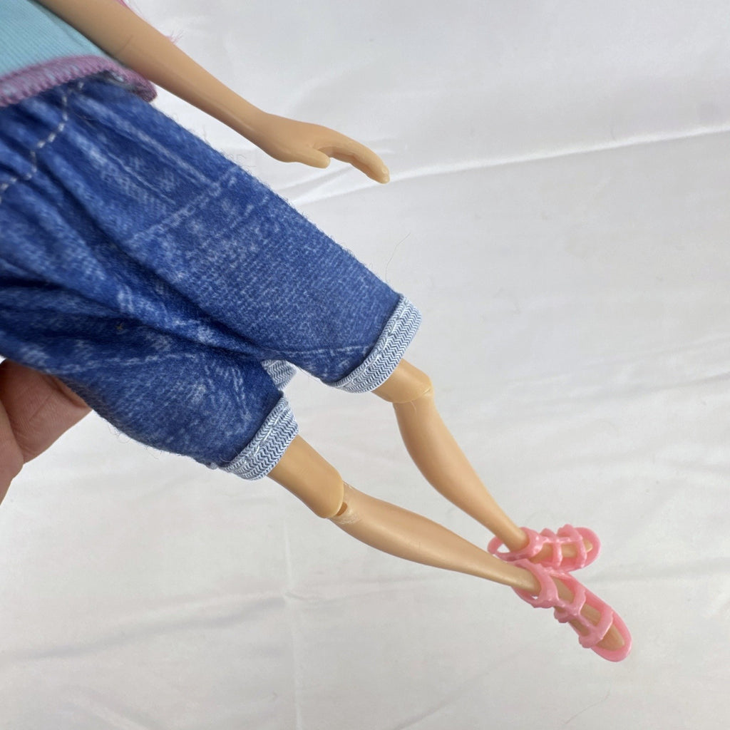 Spin Master La Dee Da Dee 10-inch fashion doll in blue mermaid outfit with brown and pink hair