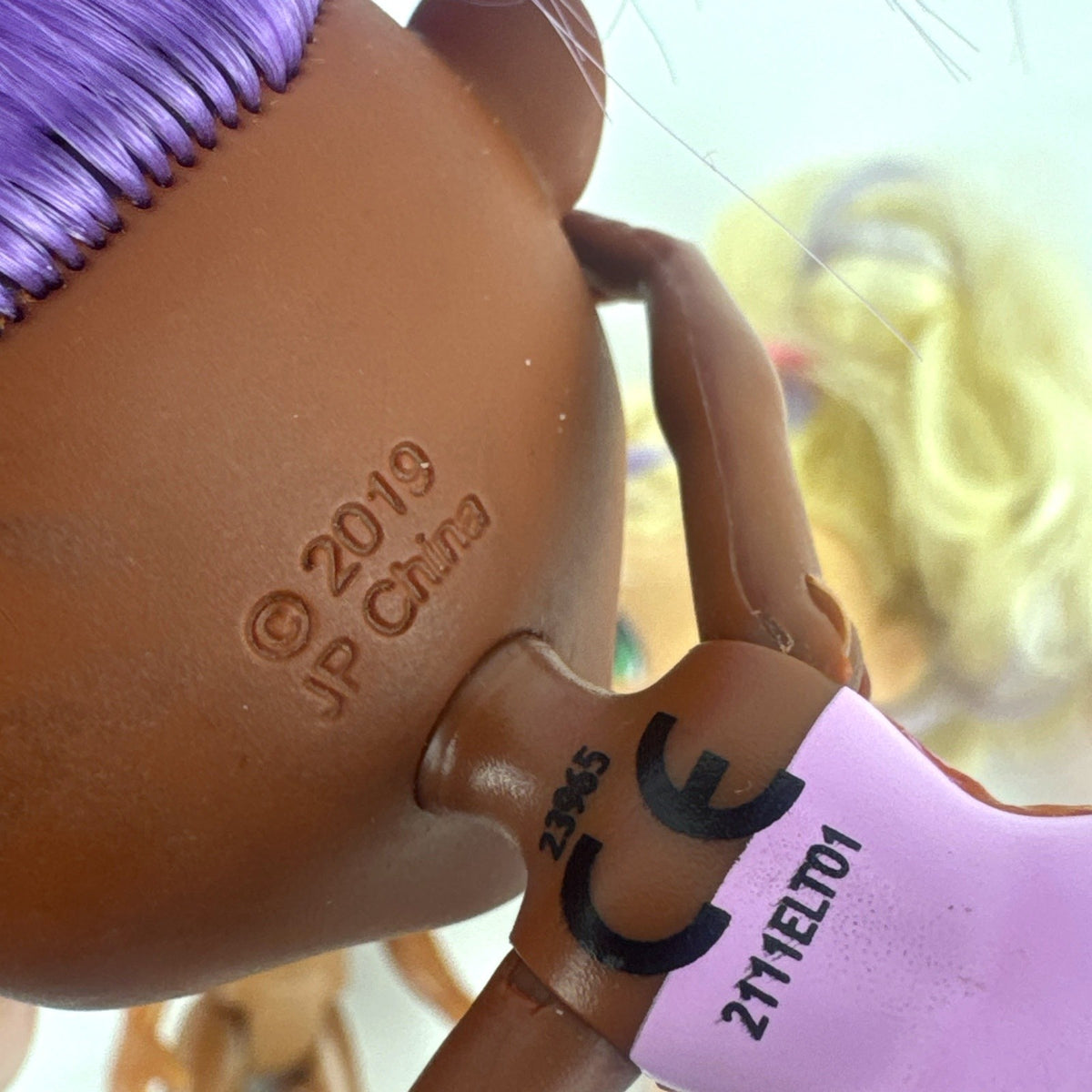 Four Just Play Hairdorables and Shortcuts mini fashion figures with colorful rooted hair