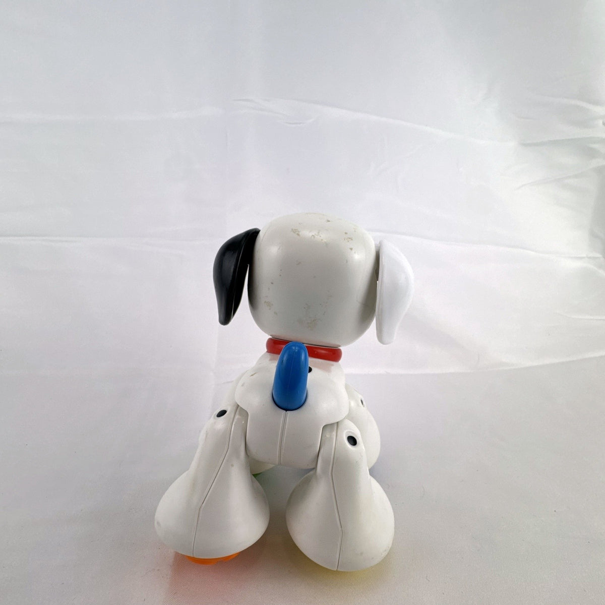 Fisher-Price crawl along Dalmatian puppy toy with colorful roller ball feet