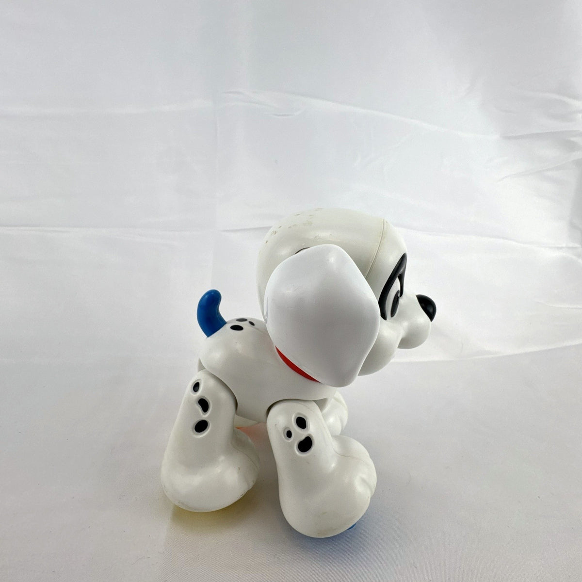 Fisher-Price crawl along Dalmatian puppy toy with colorful roller ball feet