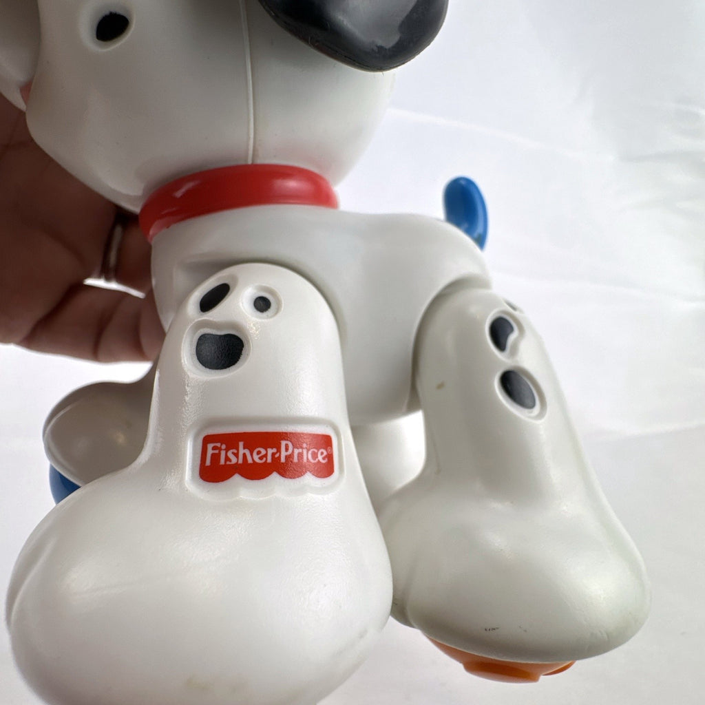 Fisher-Price crawl along Dalmatian puppy toy with colorful roller ball feet