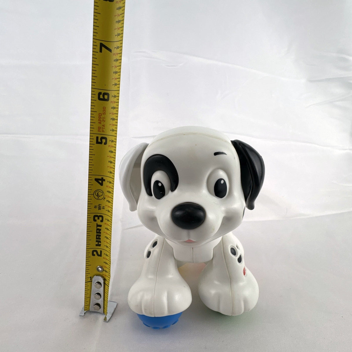 Fisher-Price crawl along Dalmatian puppy toy with colorful roller ball feet