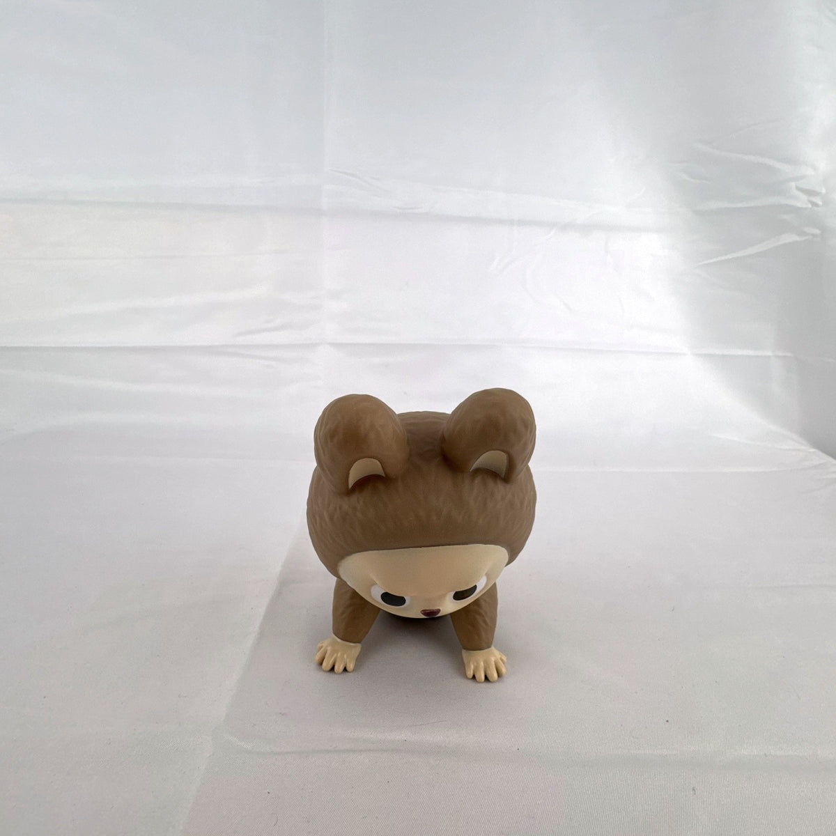 Pop Mart The Monsters Squant vinyl art figure by Kasing Lung in brown