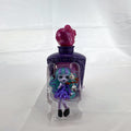 Mattel Monster High Potions Twyla mini figure inside purple potion bottle container with crystal skull topper
