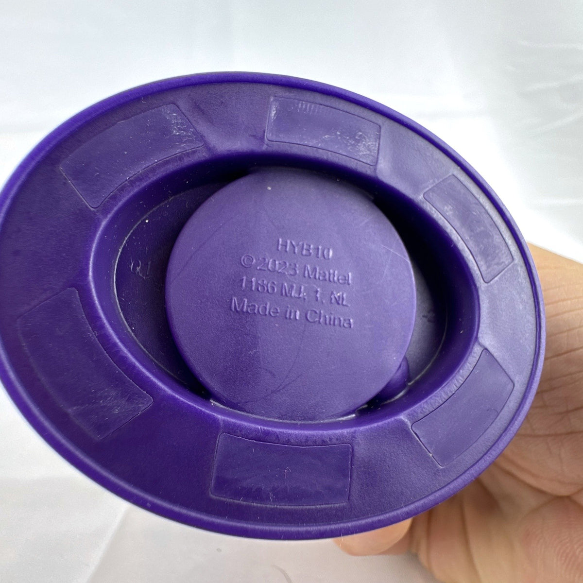 Mattel Monster High Potions Twyla mini figure inside purple potion bottle container with crystal skull topper