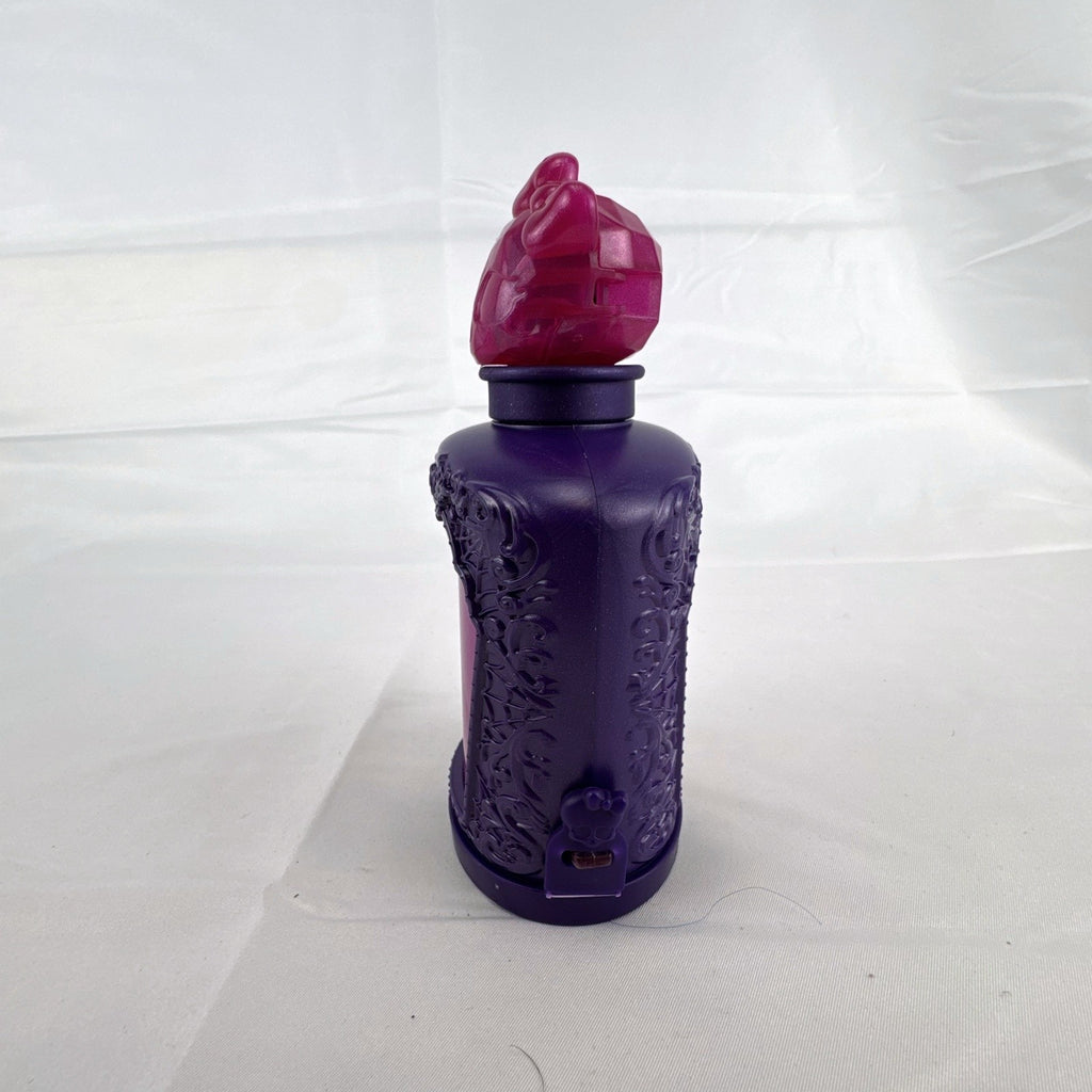 Mattel Monster High Potions Twyla mini figure inside purple potion bottle container with crystal skull topper