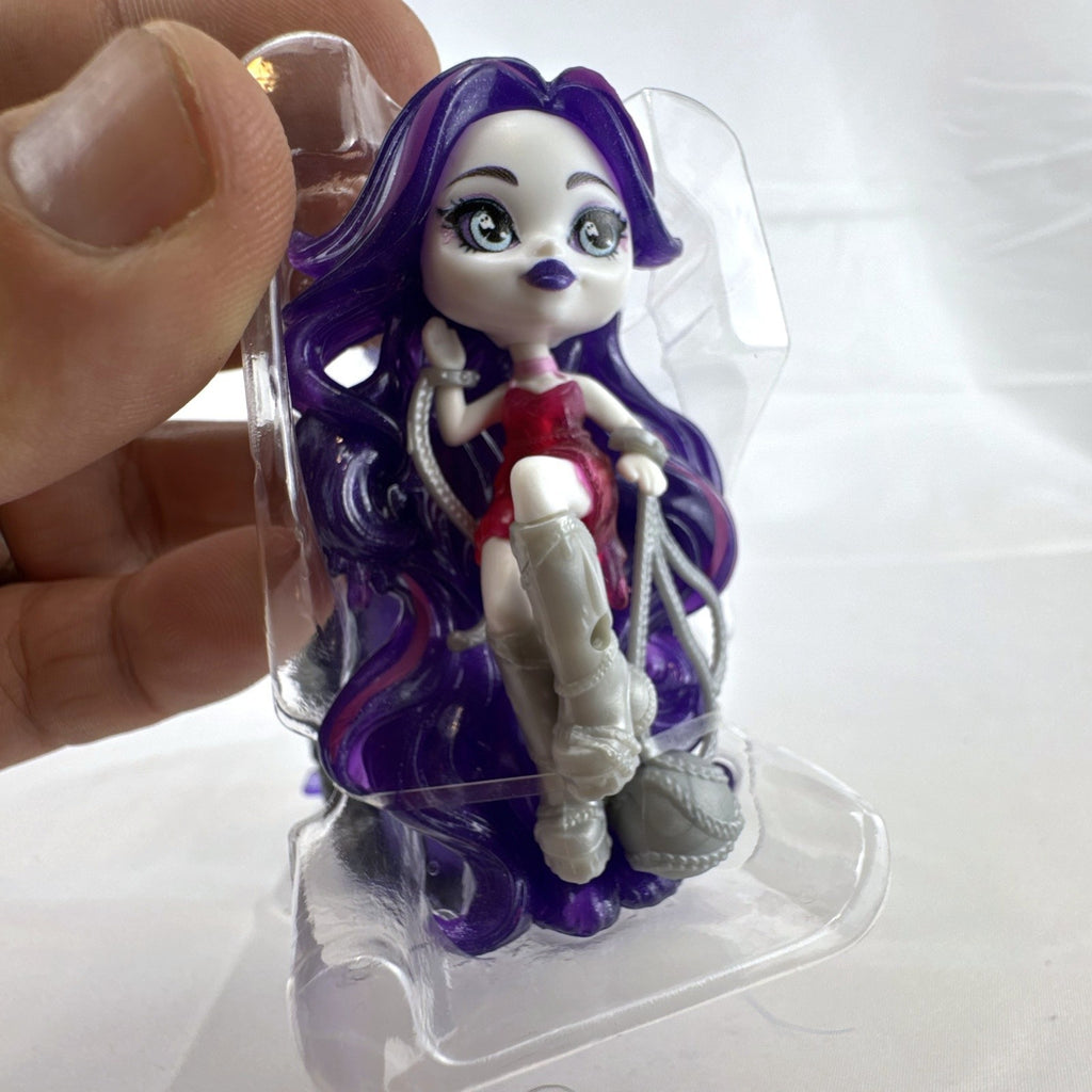 Mattel Monster High Potions Spectra Vondergeist mini figure inside black potion bottle display case