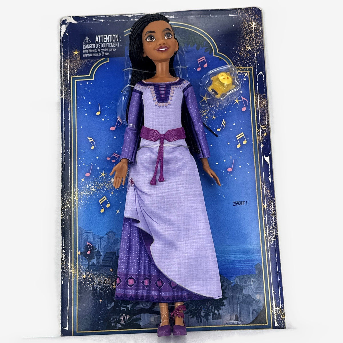 Mattel Disney Wish singing Asha 11-inch fashion doll in purple gown with yellow Star figure in original packaging
