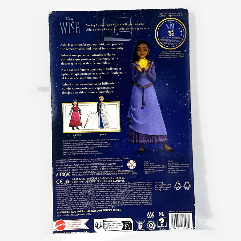 Mattel Disney Wish singing Asha 11-inch fashion doll in purple gown with yellow Star figure in original packaging