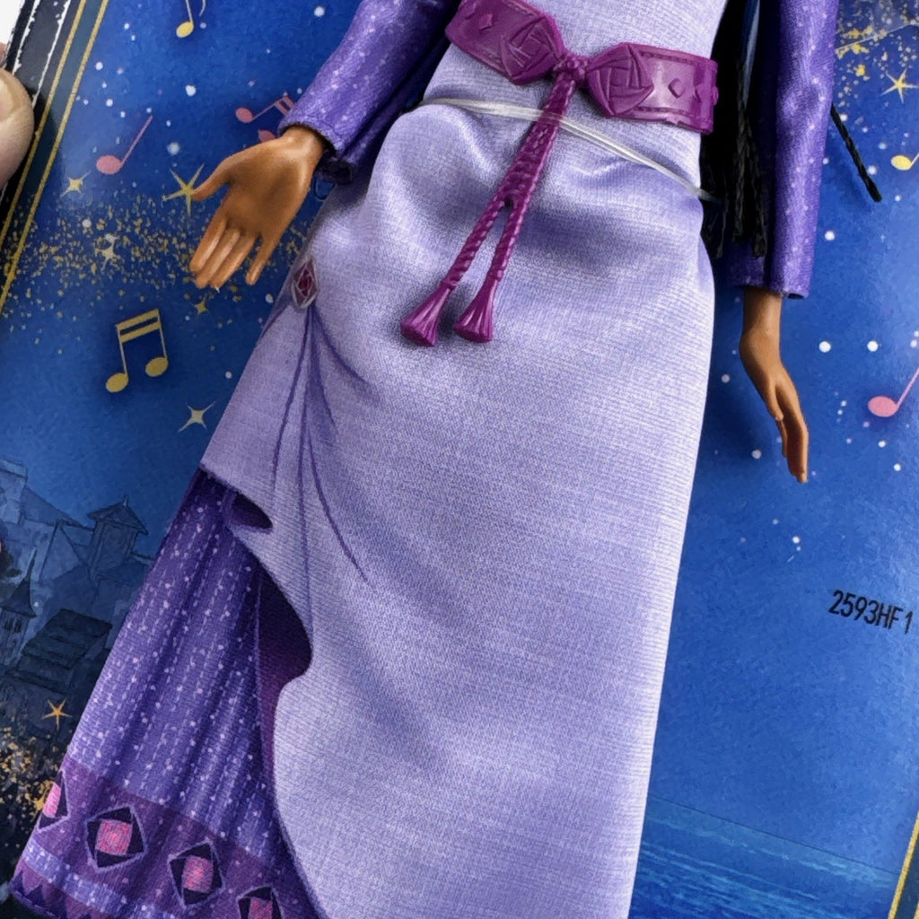Mattel Disney Wish singing Asha 11-inch fashion doll in purple gown with yellow Star figure in original packaging